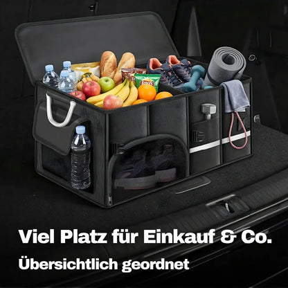 Kofferraum-Organizer im Fahrzeug-Kofferraum beladen mit Einkaufstaschen, Getränken und Werkzeug in geordneter Aufteilung